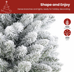 The Winterhaven™ Snow-Flocked Pre-Lit Christmas Tree